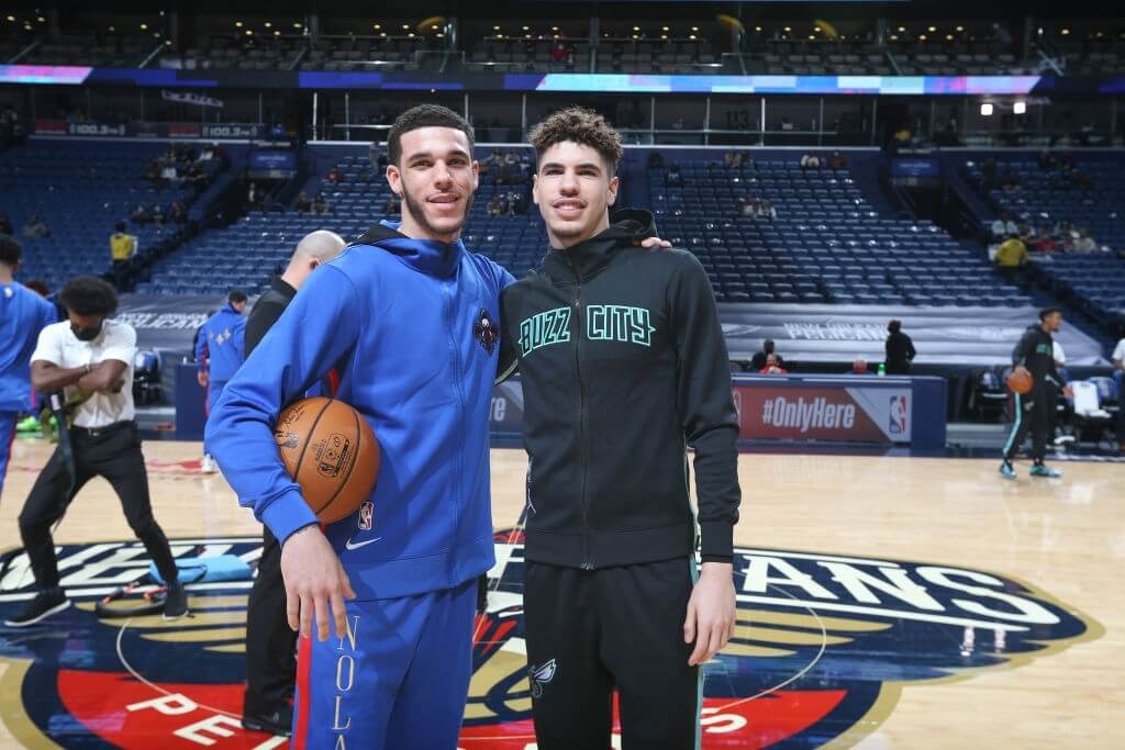 NEW ORLEANS, LA - JANUARY 8: LaMelo Ball #2 of the Charlotte Hornets and Lonzo Ball #2 of the New Orleans Pelicans before the game on January 8, 2021 at the Smoothie King Center in New Orleans, Louisiana. NOTE TO USER: User expressly acknowledges and agrees that, by downloading and or using this Photograph, user is consenting to the terms and conditions of the Getty Images License Agreement. Mandatory Copyright Notice: Copyright 2021 NBAE