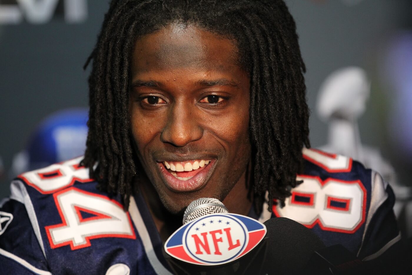 Feb 2, 2012; Indianapolis, IN, USA; New England Patriots receiver Deion Branch (84) answers questions during a press conference in preparation for Super Bowl XLVI against the New York Giants at Lucas Oil Stadium. Mandatory Credit: Matthew Emmons-USA TODAY Sports