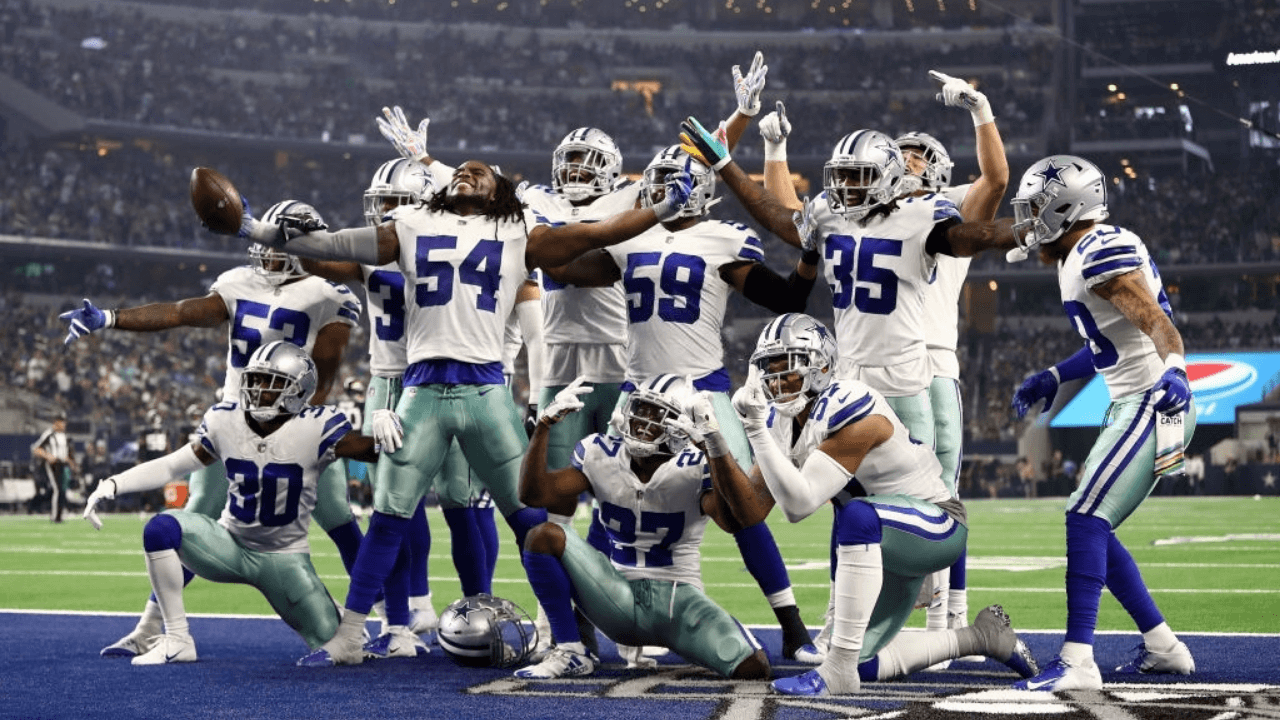 ARLINGTON, TX - OCTOBER 14: The Dallas Cowboys defensive line celebrates a fumble recovery against the Jacksonville Jaguars in the third quarter of a game at AT&T Stadium on October 14, 2018 in Arlington, Texas. (Photo by Ronald Martinez/Getty Images)
