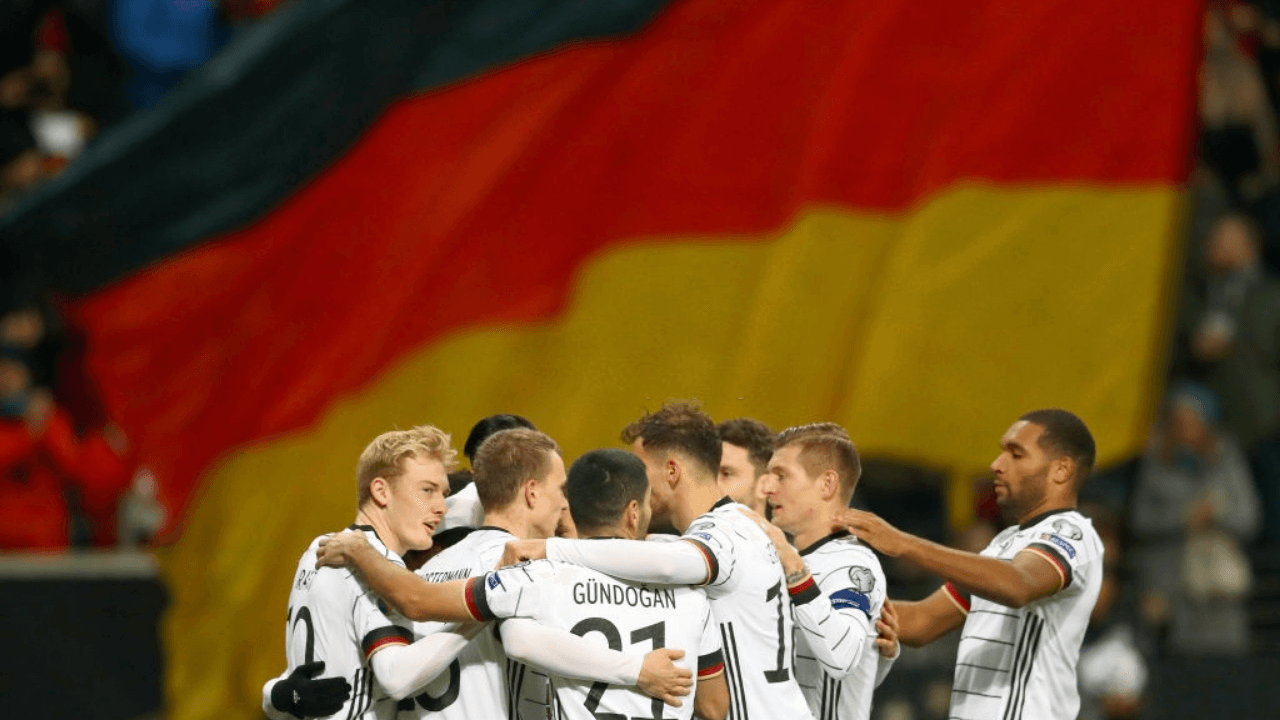 FRANKFURT AM MAIN, GERMANY - NOVEMBER 19: Serge Gnabry of Germany celebrates with his team mates after scoring his team's third goal during the UEFA Euro 2020 Qualifier between Germany and Northern Ireland at Commerzbank Arena on November 19, 2019 in Frankfurt am Main, Germany. (Photo by Lars Baron/Bongarts/Getty Images)