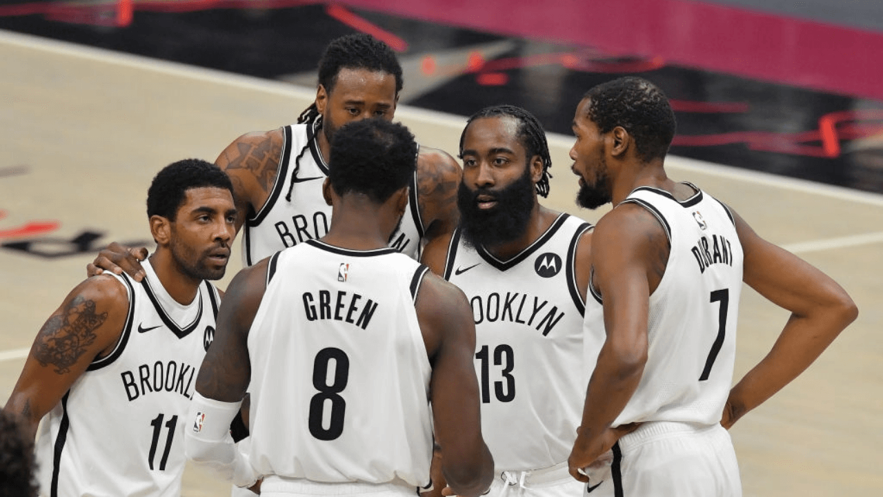 CLEVELAND, OHIO - JANUARY 20: Kyrie Irving #11 DeAndre Jordan #6 Jeff Green #8 James Harden #13 and Kevin Durant #7 of the Brooklyn Nets huddle on the court during the third quarter against the Cleveland Cavaliers at Rocket Mortgage Fieldhouse on January 20, 2021 in Cleveland, Ohio. NOTE TO USER: User expressly acknowledges and agrees that, by downloading and/or using this photograph, user is consenting to the terms and conditions of the Getty Images License Agreement. (Photo by Jason Miller/Getty Images)