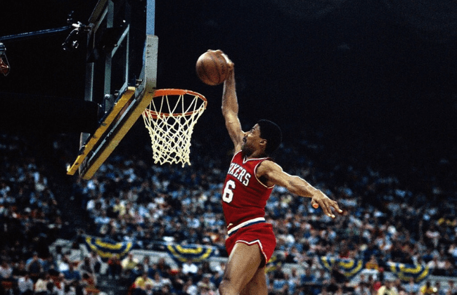 3/5/1985 Action, Philadelphia 76ers' Julius Erving making a basket during unidentified game (dunking).
