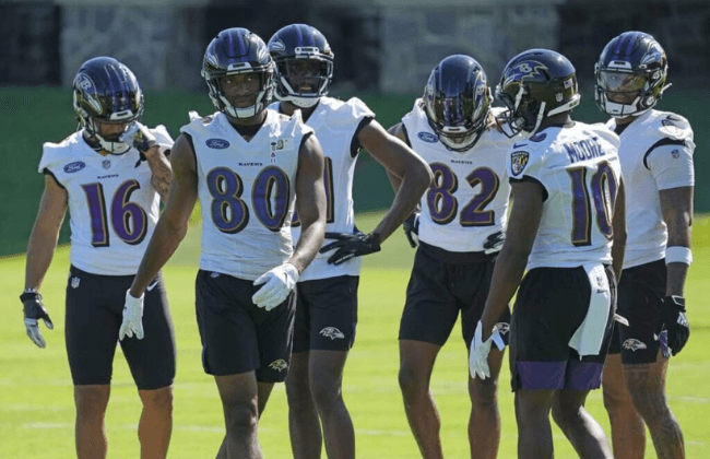 Jun 15, 2021; Owings Mills, Maryland, USA; Baltimore Ravens wide receivers Tylan Wallace (16), Miles Boykin (80), Donte Sylencieux (82), Jaylon Moore (10) and others warm up during mandatory mini camp at the Under Armor Performance Center. Mandatory Credit: Mitch Stringer-USA TODAY Sports