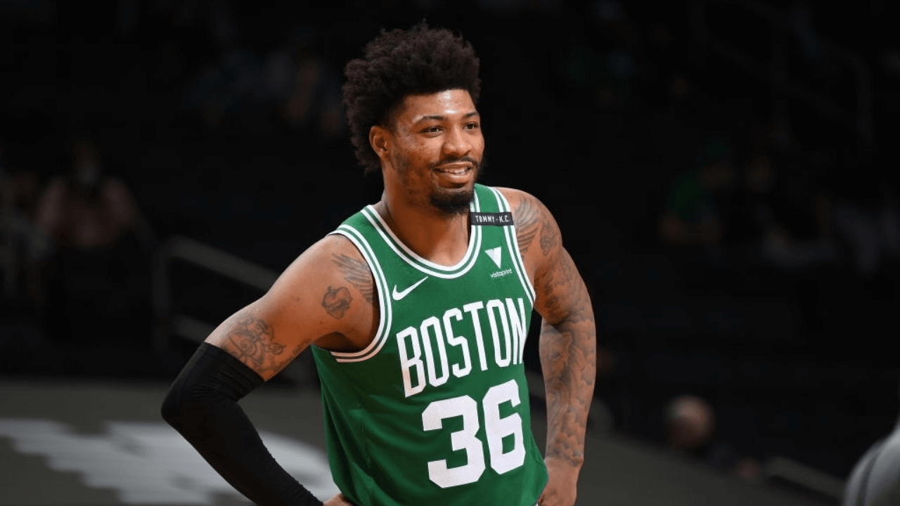 BOSTON, MA - APRIL 7: Marcus Smart #36 of the Boston Celtics smiles during the game against the New York Knicks on April 7, 2021 at the TD Garden in Boston, Massachusetts. NOTE TO USER: User expressly acknowledges and agrees that, by downloading and or using this photograph, User is consenting to the terms and conditions of the Getty Images License Agreement. Mandatory Copyright Notice: Copyright 2021 NBAE (Photo by Brian Babineau/NBAE via Getty Images)