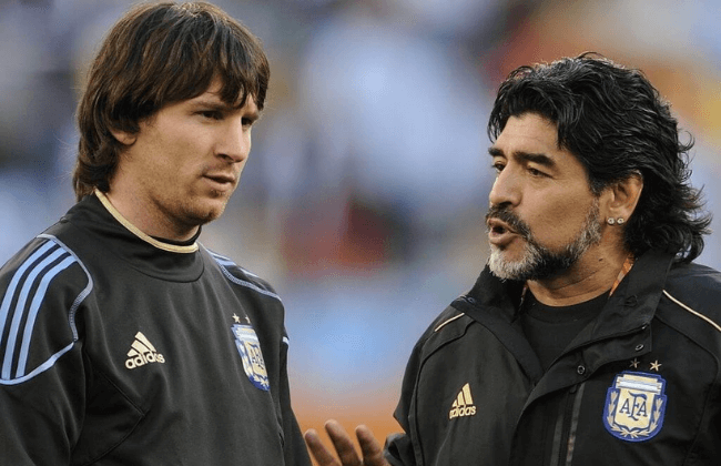 Argentina's coach Diego Maradona (R) speaks to Argentina's striker Lionel Messi prior the 2010 World Cup quarter-final match Argentina vs. Germany on July 3, 2010 at Green Point stadium in Cape Town.  NO PUSH TO MOBILE / MOBILE USE SOLELY WITHIN EDITORIAL ARTICLE -   AFP PHOTO / JAVIER SORIANO (Photo credit should read JAVIER SORIANO/AFP via Getty Images)