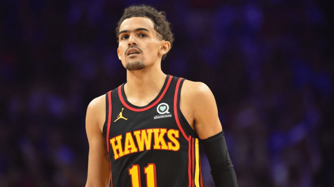 PHILADELPHIA, PA - JUNE 20: Trae Young #11 of the Atlanta Hawks looks on during Round 2, Game 7 of the Eastern Conference Playoffs on June 20, 2021 at Wells Fargo Center in Philadelphia, Pennsylvania. NOTE TO USER: User expressly acknowledges and agrees that, by downloading and/or using this Photograph, user is consenting to the terms and conditions of the Getty Images License Agreement. Mandatory Copyright Notice: Copyright 2021 NBAE (Photo by Jesse D. Garrabrant/NBAE via Getty Images)