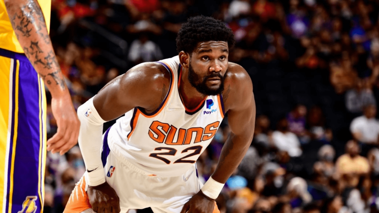 PHOENIX, AZ - OCTOBER 6: Deandre Ayton #22 of the Phoenix Suns looks on during the game against the Los Angeles Lakers during a preseason game on October 6, 2021 at Footprint Center in Phoenix, Arizona. NOTE TO USER: User expressly acknowledges and agrees that, by downloading and or using this photograph, user is consenting to the terms and conditions of the Getty Images License Agreement. Mandatory Copyright Notice: Copyright 2021 NBAE (Photo by Barry Gossage/NBAE via Getty Images)