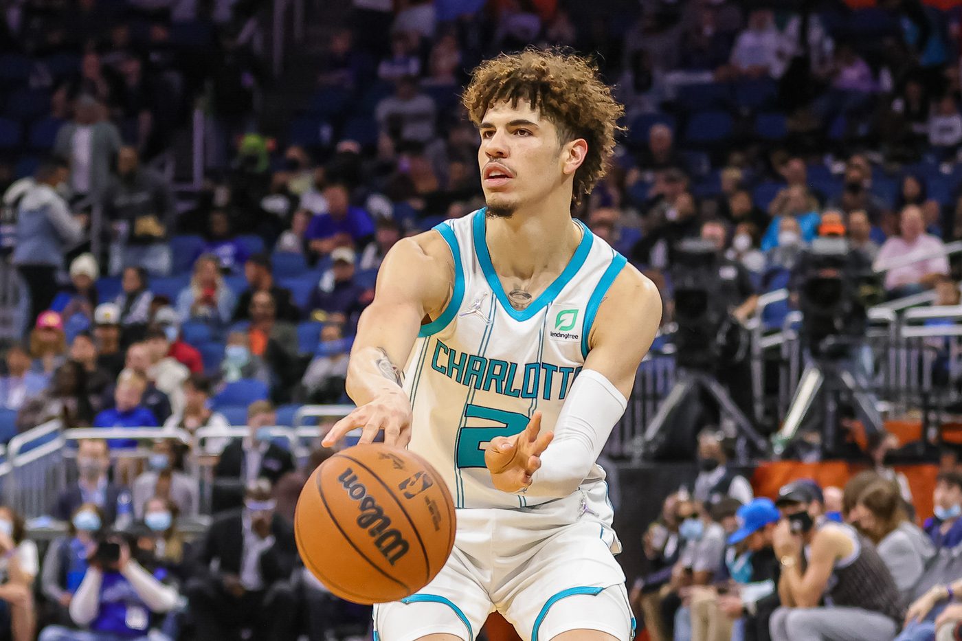 Nov 24, 2021; Orlando, Florida, USA; Charlotte Hornets guard LaMelo Ball (2) passes the ball during the first quarter against the Orlando Magic at Amway Center. Mandatory Credit: Mike Watters-USA TODAY Sports