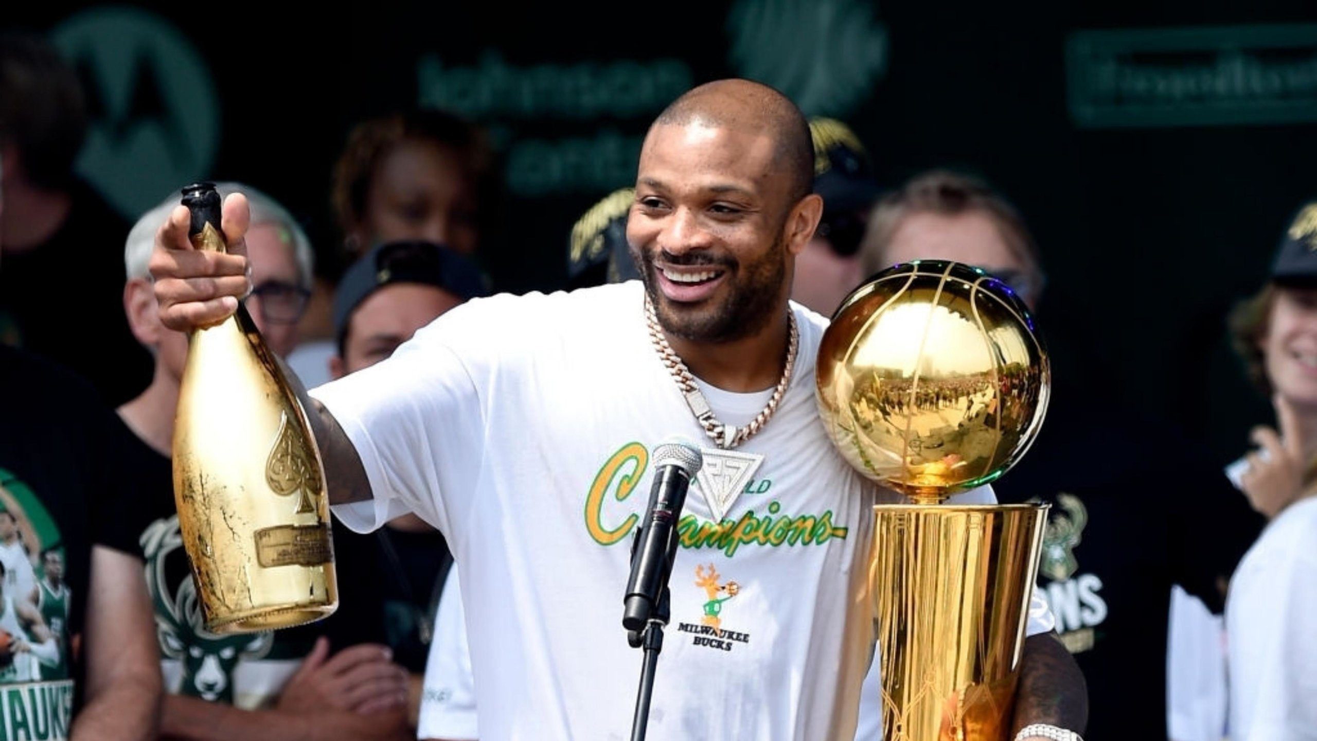 MILWAUKEE, WISCONSIN - JULY 22: P.J. Tucker celebrates with the Larry O'Brien trophy during the Milwaukee Bucks 2021 NBA Championship Victory Parade and Rally in the Deer District of Fiserv Forum on July 22, 2021 in Milwaukee, Wisconsin. NOTE TO USER: User expressly acknowledges and agrees that, by downloading and or using this photograph, User is consenting to the terms and conditions of the Getty Images License Agreement. (Photo by Patrick McDermott/Getty Images)