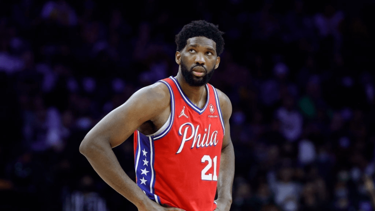 PHILADELPHIA, PENNSYLVANIA - DECEMBER 11: Joel Embiid #21 of the Philadelphia 76ers looks on during the fourth quarter against the Golden State Warriors at Wells Fargo Center on December 11, 2021 in Philadelphia, Pennsylvania. NOTE TO USER: User expressly acknowledges and agrees that, by downloading and or using this photograph, User is consenting to the terms and conditions of the Getty Images License Agreement. (Photo by Tim Nwachukwu/Getty Images)