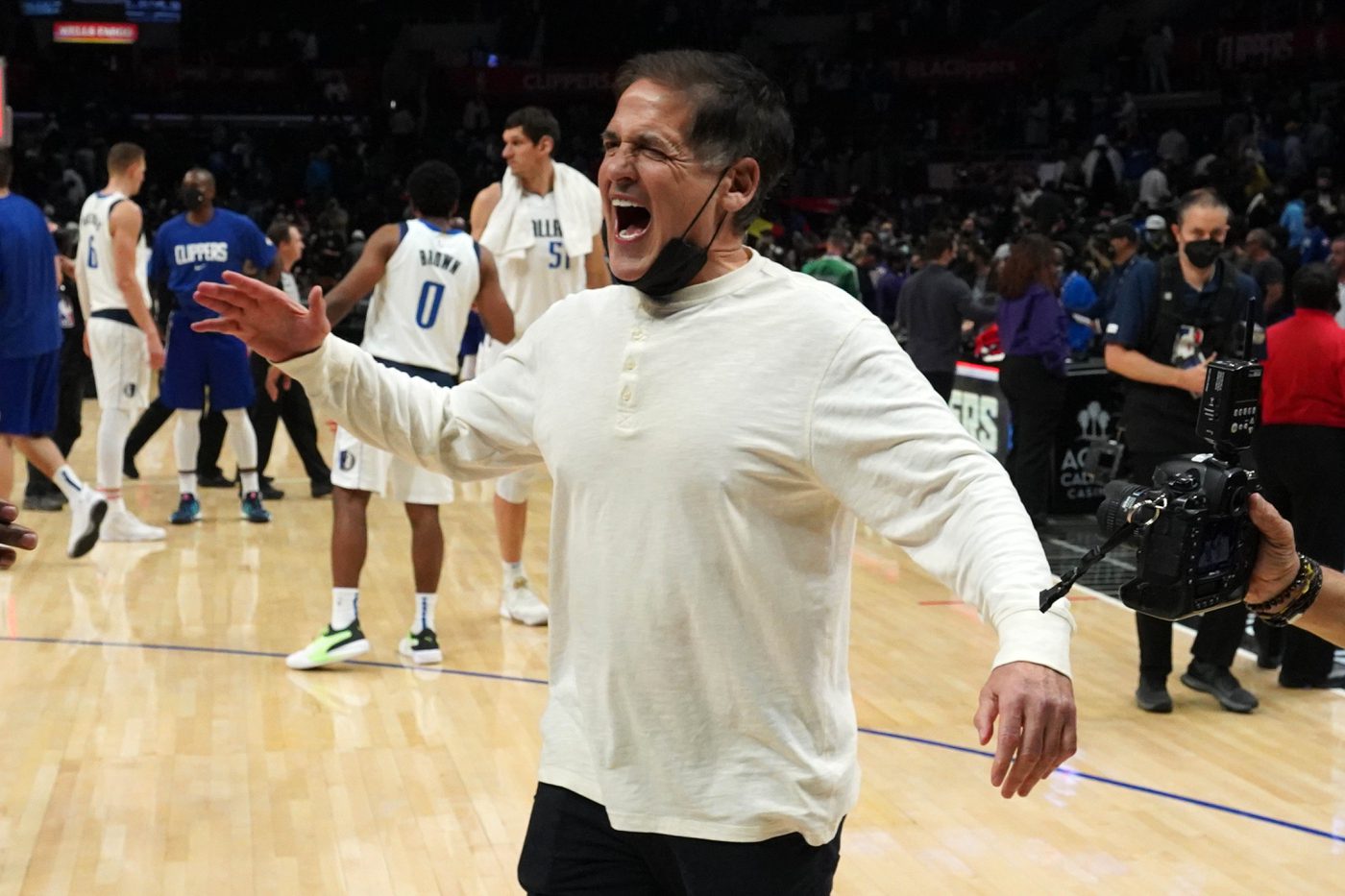 Nov 23, 2021; Los Angeles, California, USA; Dallas Mavericks owner Mark Cuban celebrates at the end of the game against the LA Clippers at Staples Center. The Mavericks defeated the Clippers 112-104 in overtime.Mandatory Credit: Kirby Lee-USA TODAY Sports