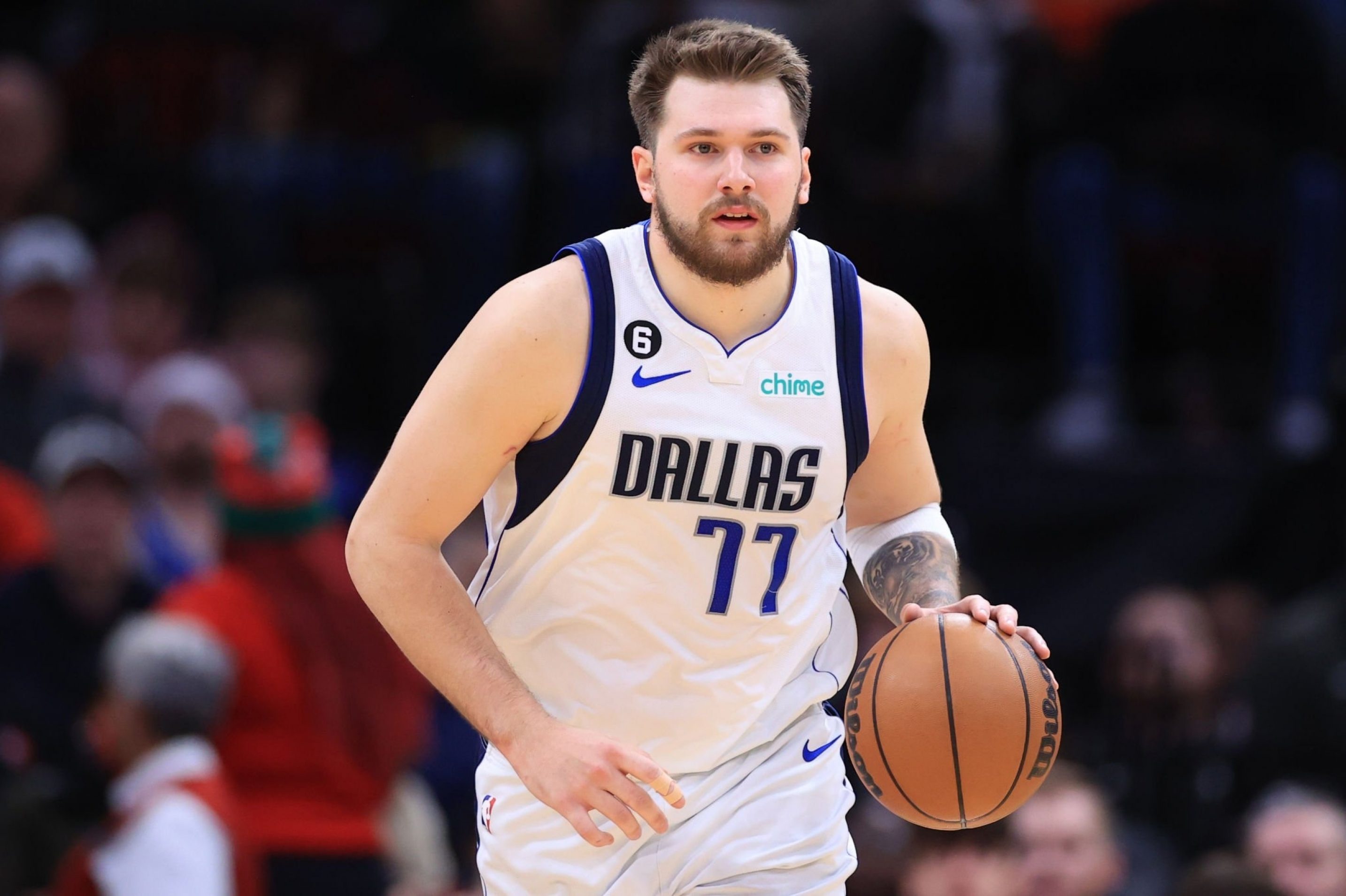 HOUSTON, TEXAS - DECEMBER 23: Luka Doncic #77 of the Dallas Mavericks controls the ball during the second half against the Houston Rockets at Toyota Center on December 23, 2022 in Houston, Texas.