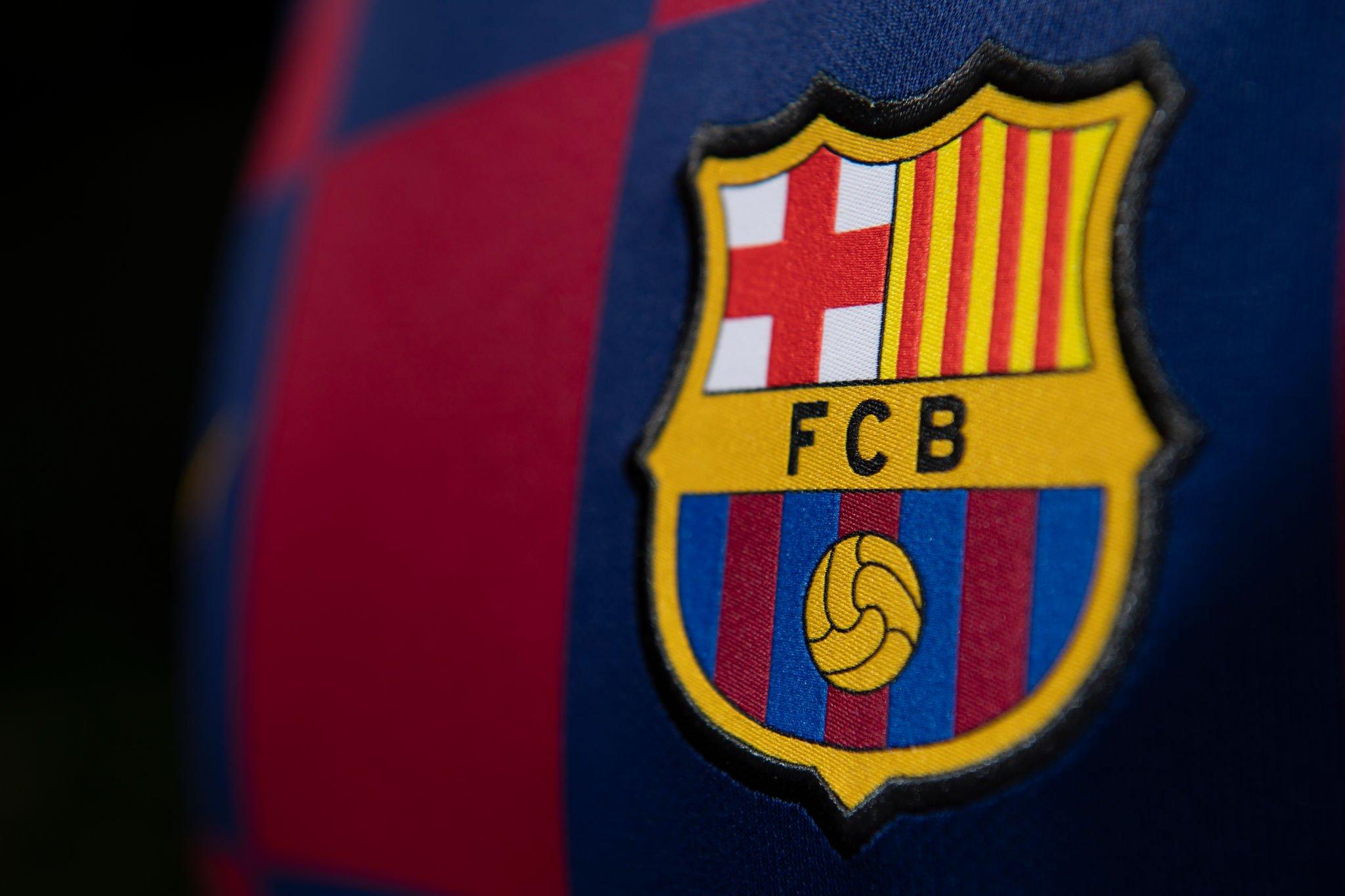 MANCHESTER, ENGLAND - JULY 19: The FC Barcelona club crest on the first team home shirt on July 19, 2020 in Manchester, United Kingdom. (Photo by Visionhaus)