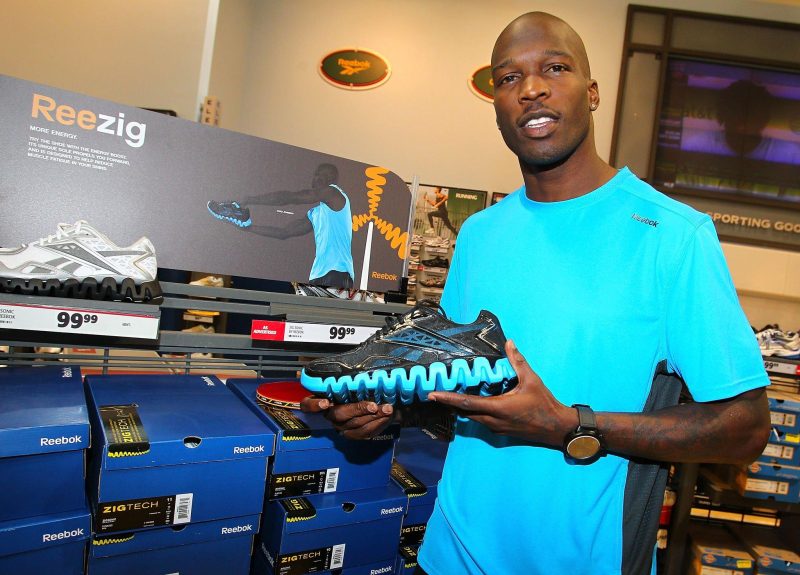 CARMEL, IN - MARCH 22: Chad Ochocinco surprises customers with Reebok ZigTech apparel at Dick's Sporting Goods on March 22, 2011 in Carmel, Indiana. (Photo by Michael Hickey/WireImage for Reebok)