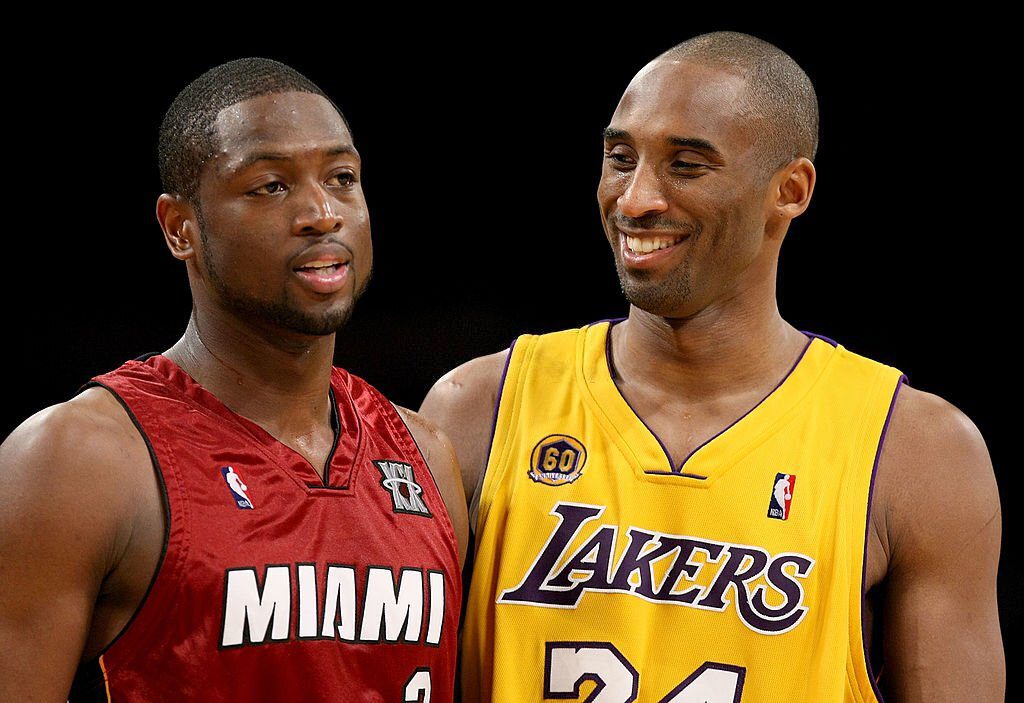 LOS ANGELES - FEBRUARY 28: Dwyane Wade #3 of the Miami Heat and Kobe Bryant #24 of the Los Angeles Lakers talk during a break in the game on February 28, 2008 at Staples Center in Los Angeles, California. The Lakers won 106-88. NOTE TO USER: User expressly acknowledges and agrees that, by downloading and/or using this Photograph, user is consenting to the terms and conditions of the Getty Images License Agreement. (Photo by Stephen Dunn/Getty Images)