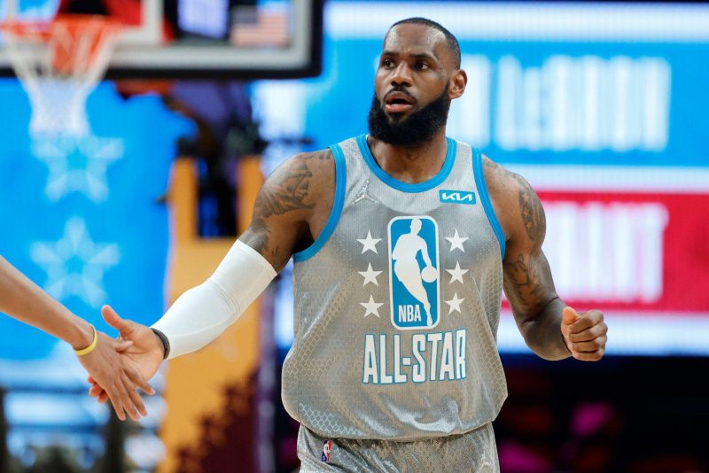 CLEVELAND, OHIO - FEBRUARY 20: LeBron James #6 of Team LeBron looks on against Team Durant during the 2022 NBA All-Star Game at Rocket Mortgage Fieldhouse on February 20, 2022 in Cleveland, Ohio. NOTE TO USER: User expressly acknowledges and agrees that, by downloading and or using this photograph, User is consenting to the terms and conditions of the Getty Images License Agreement. (Photo by Tim Nwachukwu/Getty Images) 