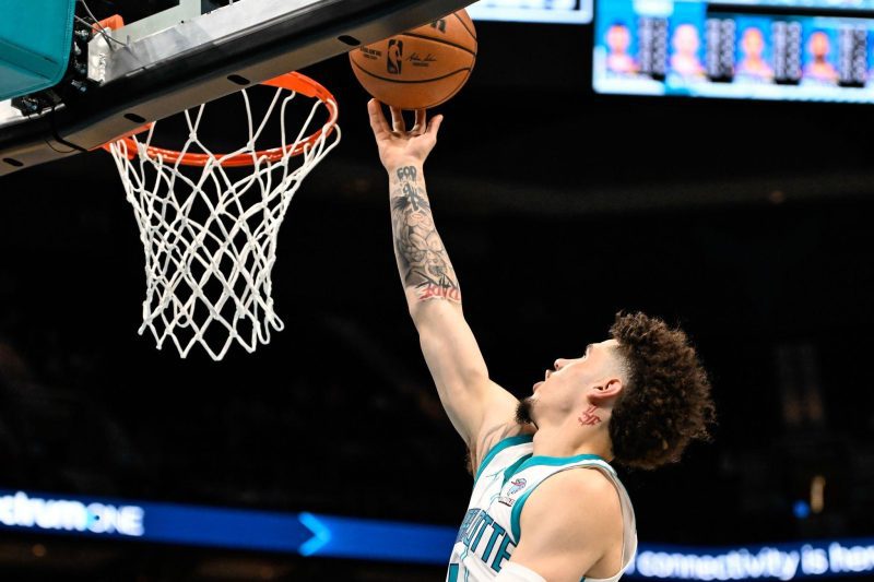 CHARLOTTE, NORTH CAROLINA - OCTOBER 15: LaMelo Ball #1 of the Charlotte Hornets drives to the basket for a layup during the first quarter of his game against the Oklahoma City Thunder at Spectrum Center on October 15, 2023 in Charlotte, North Carolina. NOTE TO USER: User expressly acknowledges and agrees that, by downloading and or using this photograph, User is consenting to the terms and conditions of the Getty Images License Agreement.  (Photo by Matt Kelley/Getty Images)