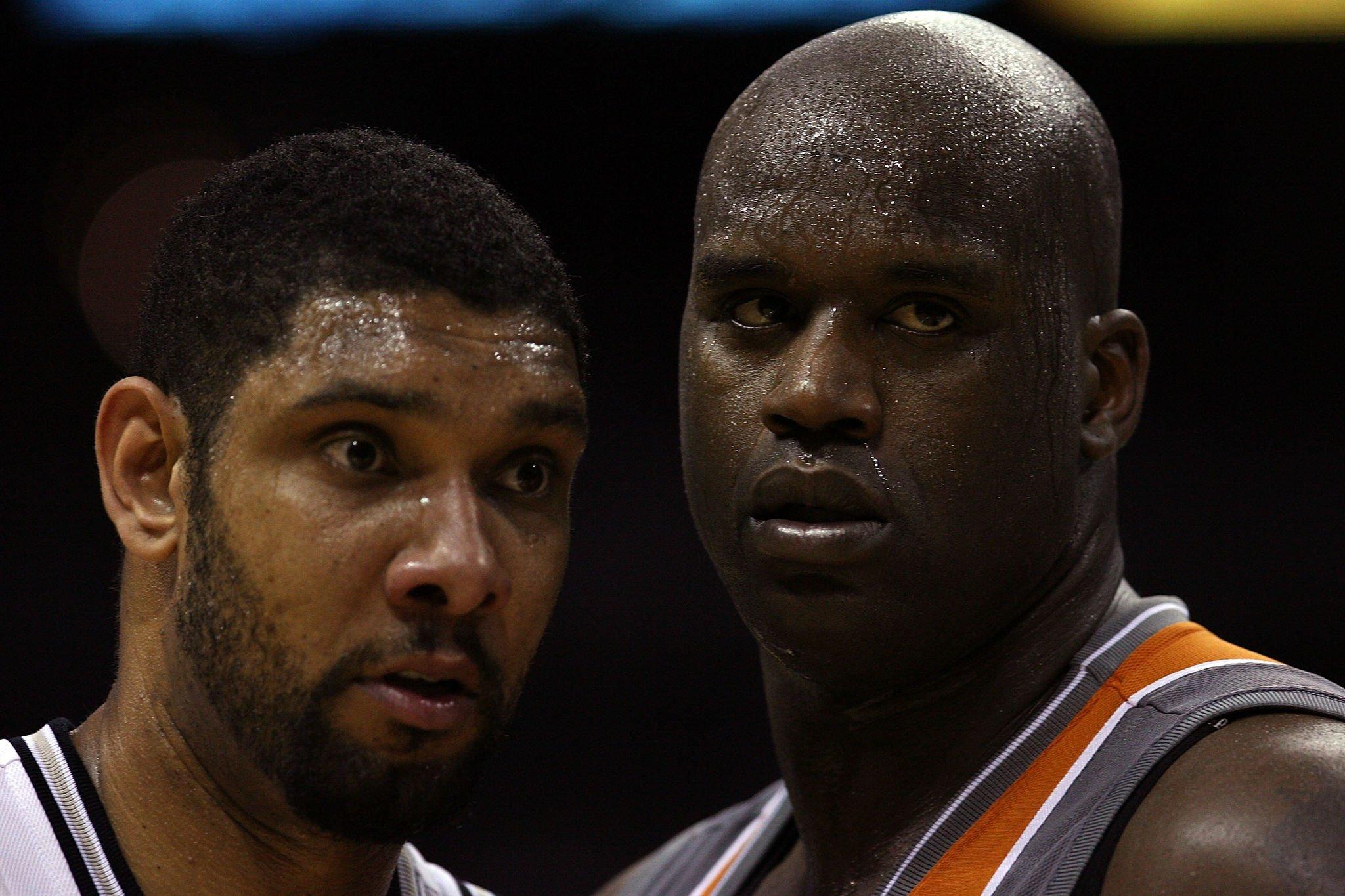 SAN ANTONIO - APRIL 19: Forward Tim Duncan #21 of the San Antonio Spurs and Shaquille O'Neal #32 of the Phoenix Suns in Game One of the Western Conference Quarterfinals during the 2008 NBA Playoffs at the AT&T Center on April 19, 2008 in San Antonio, Texas. NOTE TO USER: User expressly acknowledges and agrees that, by downloading and or using this photograph, User is consenting to the terms and conditions of the Getty Images License Agreement. (Photo by Ronald Martinez/Getty Images)