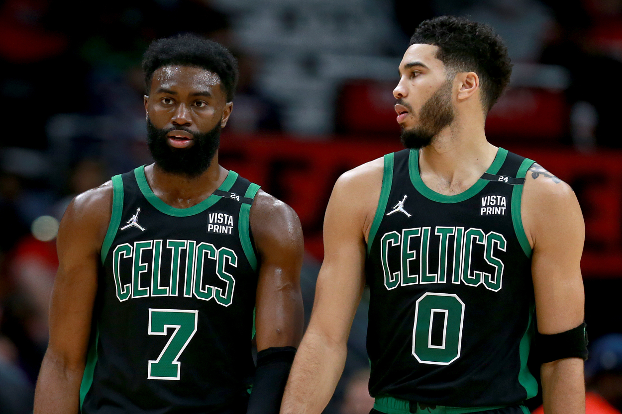 Jaylen Brown #7 of the Boston Celtics and Jayson Tatum #0 stand on the court during the third quarter of an NBA game against the New Orleans Pelicans at Smoothie King Center on January 29, 2022, in New Orleans, Louisiana. | Sean Gardner/Getty Images.