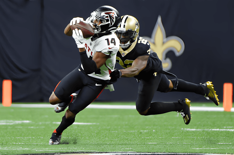 NEW ORLEANS, LA - NOVEMBER 07: Atlanta Falcons wide receiver Russell Gage (14) hauls in a slant pass as New Orleans Saints defensive back Chauncey Gardner-Johnson (22) defends during the football game between the Atlanta Falcons and New Orleans Saints at Caesar's Superdome on November 7, 2021 in New Orleans, LA. (Photo by Ken Murray/Icon Sportswire via Getty Images)