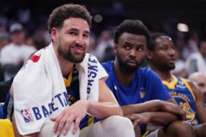 Apr 16, 2024; Sacramento, California, USA; Golden State Warriors guard Klay Thompson (11) sits on the bench during action against the Sacramento Kings in the fourth quarter during a play-in game of the 2024 NBA playoffs at the Golden 1 Center. Mandatory Credit: Cary Edmondson-USA TODAY Sports