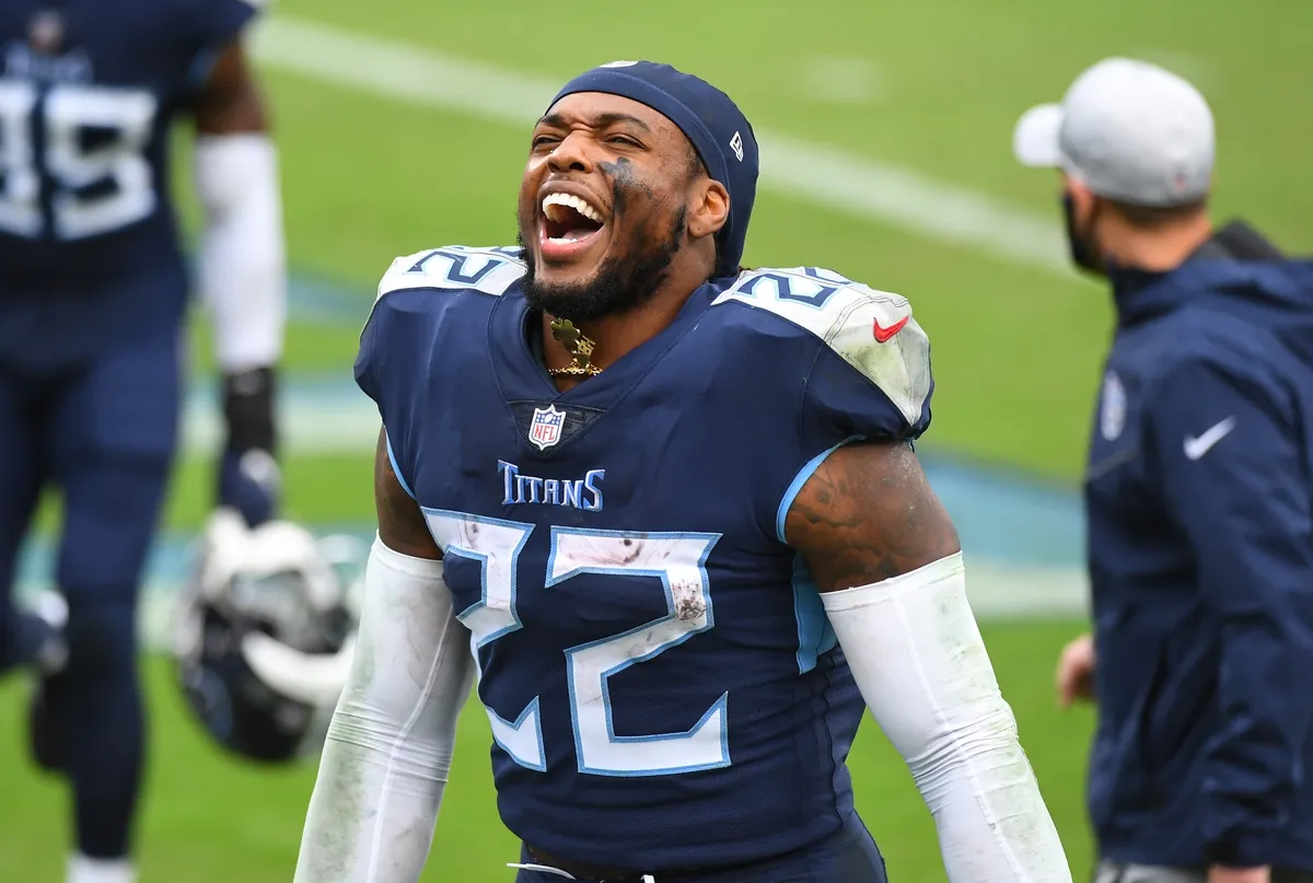 Oct 18, 2020; Nashville, Tennessee, USA; Tennessee Titans running back Derrick Henry (22) celebrates as he leaves the field after scoring the winning touchdown in overtime against the Houston Texans at Nissan Stadium. Mandatory Credit: Christopher Hanewinckel-USA TODAY Sports