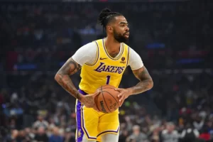 Feb 28, 2024; Los Angeles, California, USA; Los Angeles Lakers guard D'Angelo Russell (1) controls the ball against the Los Angeles Clippers during the first half at Crypto.com Arena. Mandatory Credit: Gary A. Vasquez-USA TODAY Sports